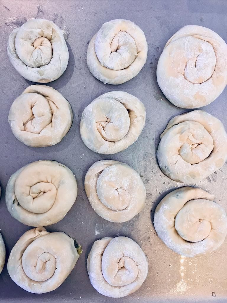 baking tray with round and rolo pies ready the oven from Greek Cooking Class from Two Minutes Angie